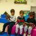 Passiamo poi dalla biblioteca dove alcuni piccoli seduti su colorati divanetti sono impegnati nella lettura di favole...